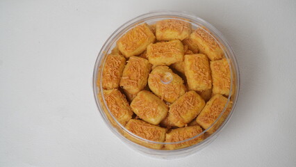 A close-up photo of traditional Indonesian cheese cookies (kastengel) 