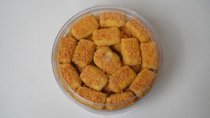 A close-up photo of traditional Indonesian cheese cookies (kastengel) 