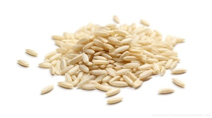 A pile of uncooked rice grains on a white background.