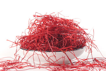 Naklejka premium Dried Red Chili Peppers Shredded Fine in White Bowl on White Background