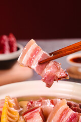 Savory Smoked Meat Slices with Chopsticks - Asian Cuisine Delicacy