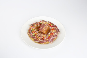 Sichuan Five-Flower Bacon Slices with Chili Peppers on White Plate - Traditional Chinese Pork Belly Dish