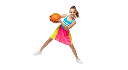 Smiling young girl in sportswear holding a basketball against a black backdrop