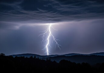 A powerful lightning bolt illuminates a stormy night sky