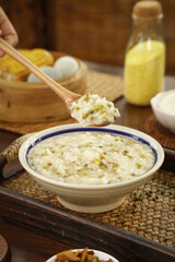 Traditional Mung Bean Porridge - Delicious Summer Heat Relief Food in Rustic Kitchen Setting