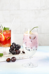 Fresh Grape Cocktails with Herbs Summer Drinks Casual Scene Marble Background