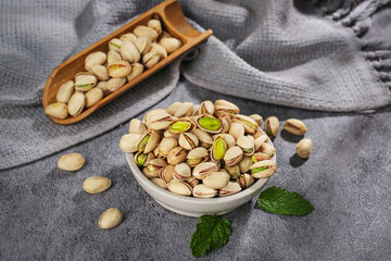 Salted Pistachios in Bowl with Wooden Scoop - Healthy Nuts Snack Food Photography