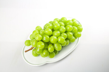 Fresh Green Seedless Grapes on White Plate - Healthy Fruit Food Photography