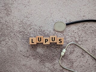 Lupus Awareness Medical Concept with Stethoscope and Wooden Blocks