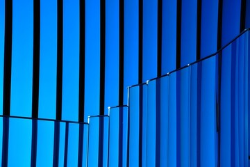Obraz premium Abstract pattern of blue metal bars with a textured industrial steel design