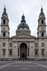 Budapest, Hungary &ndash; Architectural detail of St. Stephen&rsquo;s Basilica, showcasing its neoclassical fa&ccedil;ade, ornate columns, sculpted tympanum, and twin bell towers. A symbol of faith and grandeur.