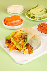 Healthy Vegetable Wraps with Fresh Ingredients and Colorful Veggie Sides