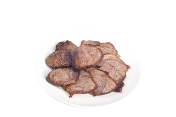 Sliced Corned Beef Brisket on White Plate Ready to Serve