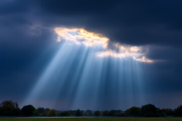 Sun rays streaming through dramatic clouds