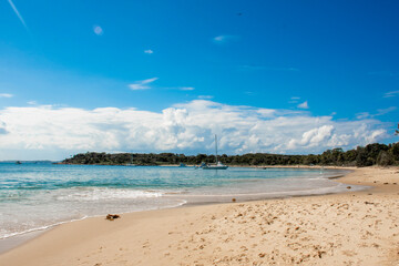Beautiful empty sandy beach. Jibbon Beach and view on Bundeena, Royal National Park, New South Wales, Australia