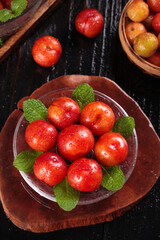 Fresh Red Plums with Mint in Glass Bowl - Crisp Sour Stone Fruit from Guangdong