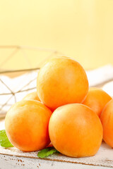 Fresh Organic Apricots from Yantai Shandong China on Rustic Wooden Table