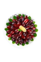 Red Grapes Arranged as Flower with Mint Leaves and Golden Raisin Center - Fresh Fruit Display