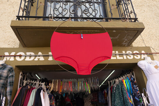 Giant red underwear hanging at market entrance in Tequisquiapan Queretaro symbol of love passion romance and Mexican tradition