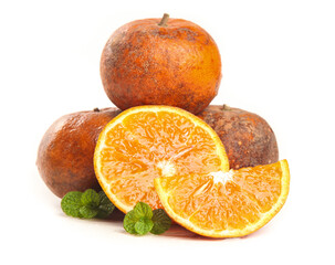 Fresh Guangxi Plateau Oranges with Peeled Segments and Mint Leaves on White Background