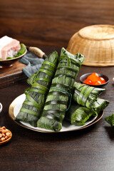 Guangxi Rice Dumplings with Salted Egg Yolk - Traditional Chinese Zongzi Wrapped in Bamboo Leaves