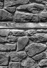 Stone wall background in black and white close up view