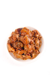 Cooked Squid Tentacles in Brown Sauce on White Plate - Fresh Seafood Dish