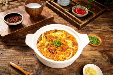 Asian Pork Stew with Glass Noodles in White Bowl on Wooden Table