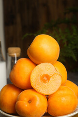 Fresh Organic Apricots with Cut Half Showing Pit - Healthy Stone Fruit Bowl
