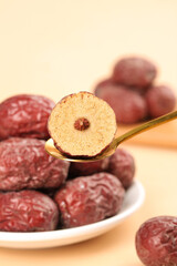 Dried Jujubes from Xinjiang China - Traditional Native Red Dates on Golden Spoon Cross Section