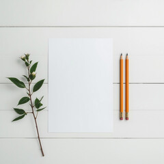 Minimalist Workspace with Stationery: An elegant, top-down perspective of a pristine workspace, complete with a blank paper, wooden pencils, and fresh plant arrangement.