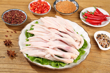 Raw Duck Feet with Spices and Seasonings for Asian Cooking on Wooden Table