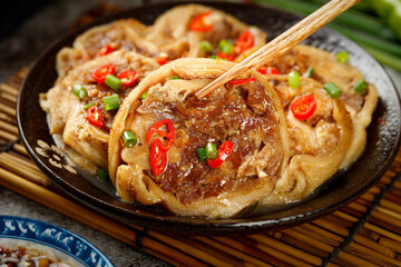 Mongolian Wrapped Lamb Belly Rolls with Chili Garnish - Traditional Inner Mongolia Cuisine