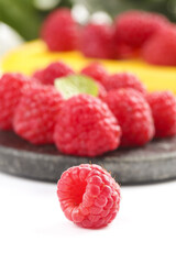 Fresh Red Raspberries on Wooden Plate - Organic Summer Berry Fruit