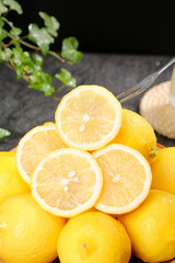 Fresh Yellow Lemons Sliced and Whole with Fork - Bright Summer Citrus Fruits Arrangement