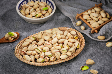 Fresh Pistachios in Wicker Basket and Bowls - Healthy Nuts Snack Food Arrangement