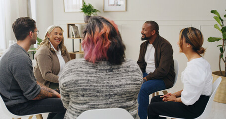 Support, group therapy and happy people in circle for addiction discussion. Psychology, men and women together for counseling, help and share story for alcoholic rehabilitation in community center