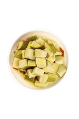 Fresh Green Mango Cubes in White Bowl on Clean White Background