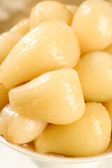 Sweet and Sour Pickled Rakkyo Japanese Onions in Bowl Close-up