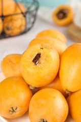 Fresh Golden Loquat Fruits Cut Open Showing Pit - High Mountain Tropical Fruit