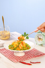 Sauteed Shrimp with Peas and Nuts Dish - Healthy Seafood Meal on White Plate
