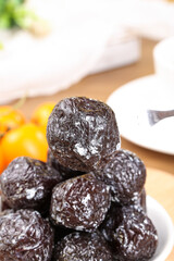 Sweet Dried Xinjiang Plums from Tianshan Mountains - Traditional Chinese Preserved Fruit with Woody Sour Flavor