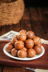 Cracked Macadamia Nuts on Plate - Premium Yunnan Imported Nuts with Creamy Flavor for Healthy Snacking