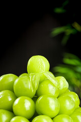 Fresh Green Grapes with Water Drops Shining in Sunlight - Healthy Organic Fruit Close-up