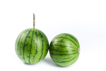 Fresh Whole Watermelons with Green Striped Skin on White Background