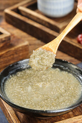 Millet Porridge Highland Grain Breakfast Shanxi Traditional Farmers Food Wooden Spoon Black Bowl Healthy Nutrition