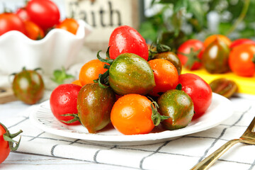 Fresh Mixed Mini Tomatoes Colorful Cherry Tomato Variety on White Plate Kitchen Display
