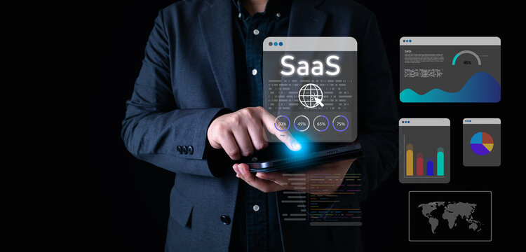SaaS platform concept with businessman using tablet and interacting with virtual dashboard and analytics interface, symbolizing software service, cloud technology, and business data solutions.