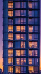 Obraz premium A tall building with many windows and a clock