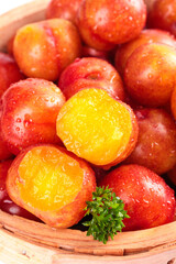 Fresh Red Plums from Guangdong China with Golden Flesh in Wooden Basket Food Display